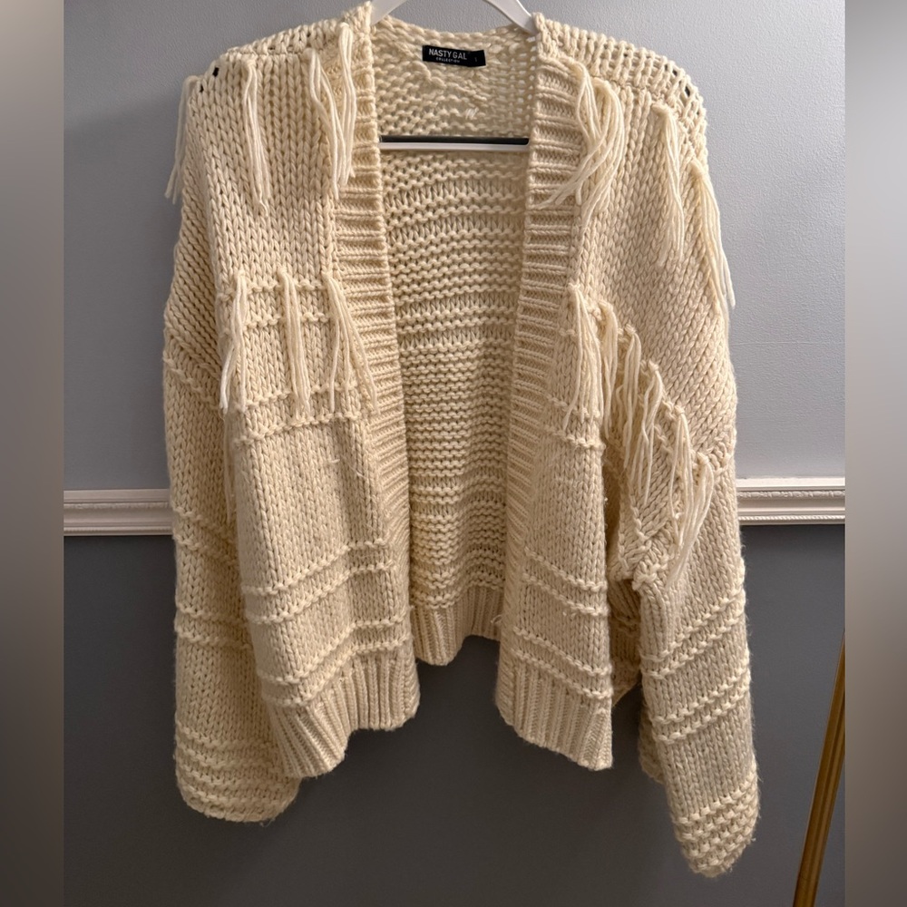 Knit cardigan with fringe detailing